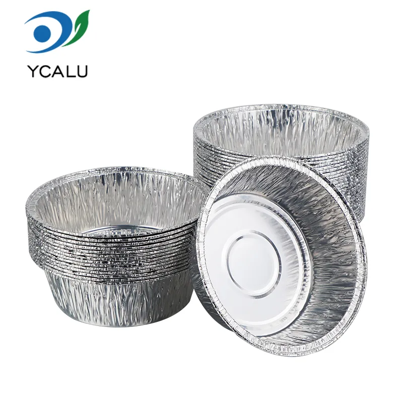 Okrągłe małe srebrne pojemniki do pieczenia z folii aluminiowej Okrągłe małe srebrne pojemniki do pieczenia z folii aluminiowej